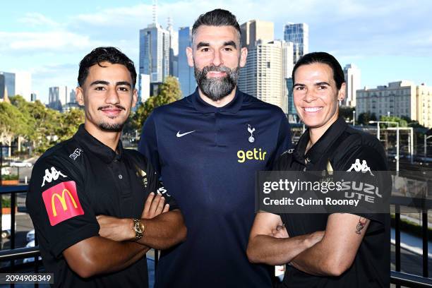 Daniel Arzani of Melbourne Victory, Mile Jedinak and Lydia Williams of Melbourne Victory pose during an A-Leagues media opportunity at Melbourne...