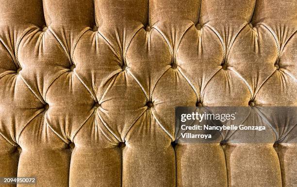 antique brown velvet upholstery on a couch with carved wood frame. - mississauga stock pictures, royalty-free photos & images