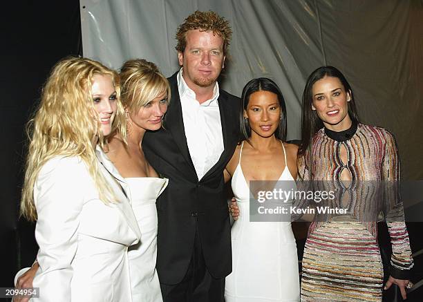 Actresses Drew Barrymore, Cameron Diaz, director McG and actresses Lucy Liu and Demi Moore pose at the after-party for "Charlie's Angels: Full...