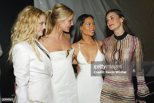 Actresses Drew Barrymore, Cameron Diaz, Lucy Liu and Demi Moore pose at the after-party for "Charlie's Angels: Full Throttle" at the Chinese Theater...