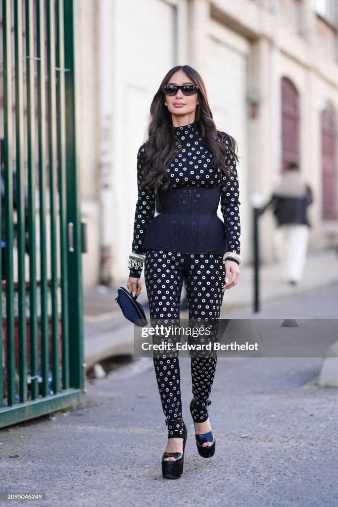 Street Style - Paris Fashion Week - Womenswear Fall/Winter 2024/2025 - Day Eight
