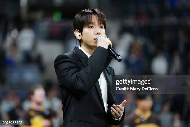 Baekhyun performs the national anthems prior to the 2024 Seoul Series game between the San Diego Padres and the Los Angeles Dodgers at Gocheok Sky...