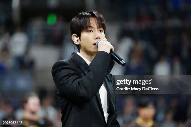 Baekhyun performs the national anthems prior to the 2024 Seoul Series game between the San Diego Padres and the Los Angeles Dodgers at Gocheok Sky...