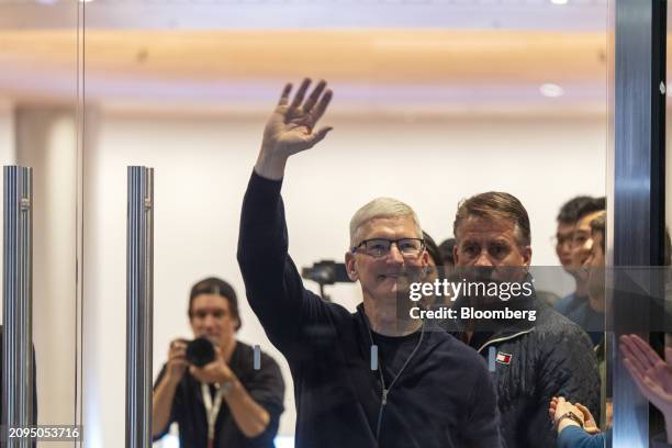 Tim Cook, chief executive officer of Apple Inc., during the opening of the new Apple Inc. Jingan store in Shanghai, China, on Thursday, March 21,...