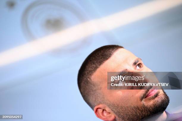 Germany's forward Deniz Undav attends a press conference after a training session of the German national football team on March 21, 2024 in Frankfurt...