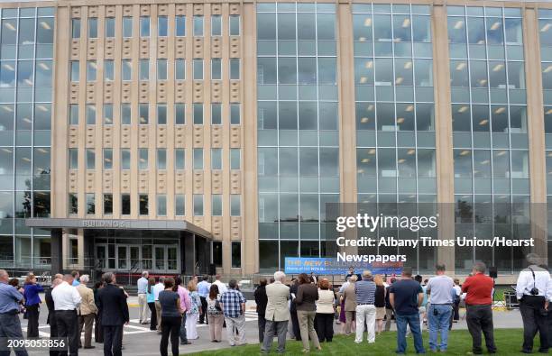 Small crowd listens to OGS Commissioner RoAnn Desito reopen the newly renovated building 5, on the Harriman Campus unused since 2004, Tuesday July 7,...