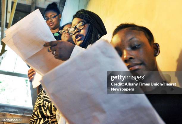 Students, from left, Aolana Taylor Zayna Roberts Annette Smalls and Taliyah Smith make their presentation on a staircase at the historic Stephen and...