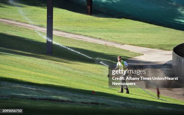 Erik Sossei of Brickman Landscaping in Schenectady waters new sod at the SPAC Thursday Sept. 24, 2015 in Saratoga Springs, NY.