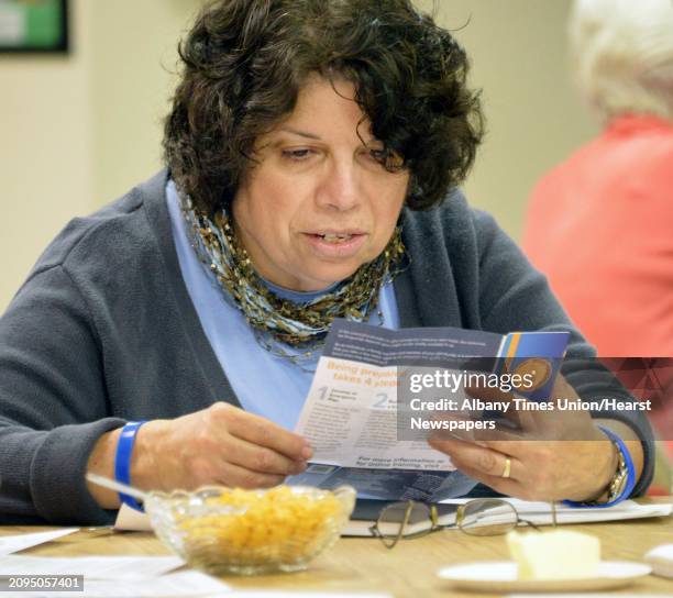 Carla Perrone of Castleton reads over an emergency supplies kit during a disaster preparedness class at Holy Spirit Lutheran Church Wednesday, Nov....