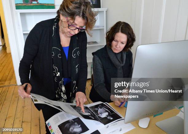 Creative director Maxine Davidowitz, left, and designer Susan Huyser work on the summer issue of Modern Farmer magazine in their Warren Street...