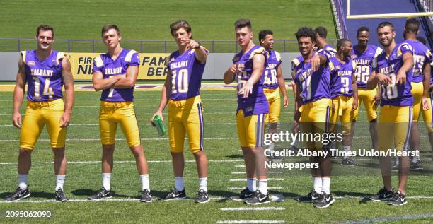 Quaterbacks mug for photos during UAlbany football media day at Casey Stadium Tuesday Aug. 9, 2016 in Albany, NY.