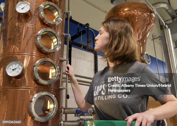 Distiller Glenna Joyce checks the column still at Upstate Distilling Company Friday Sept. 23, 2016 in Saratoga Springs, NY.