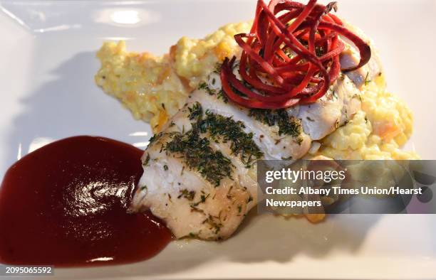 Thyme encrusted chicken served over butternut squash risotto finished with raspberry reduction at Willows Bistro on Prospect Street Friday Jan. 20,...