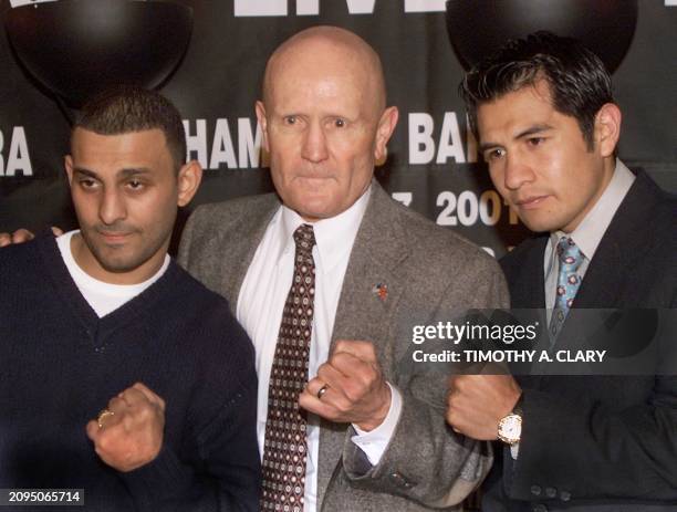 Prince Naseen Hamed of Great Britain poses with Marco Antonio Barrera of Mexico and promoter Mills Lane before the start of their press conference 14...