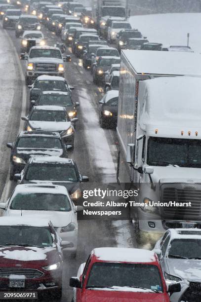 Southbound traffic on I-87 creeps along as a nor'easter hits the Capital Region Thursday Feb. 9, 2017 in Clifton Park, NY.