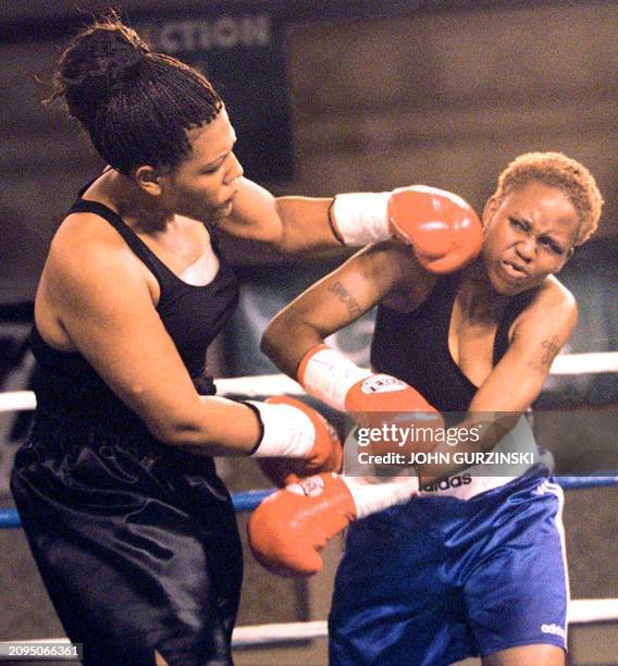 Freeda Foreman , daughter of former boxing champion George Foreman, lands a left to the head of LaQuanda Landers in the first round of their pro...