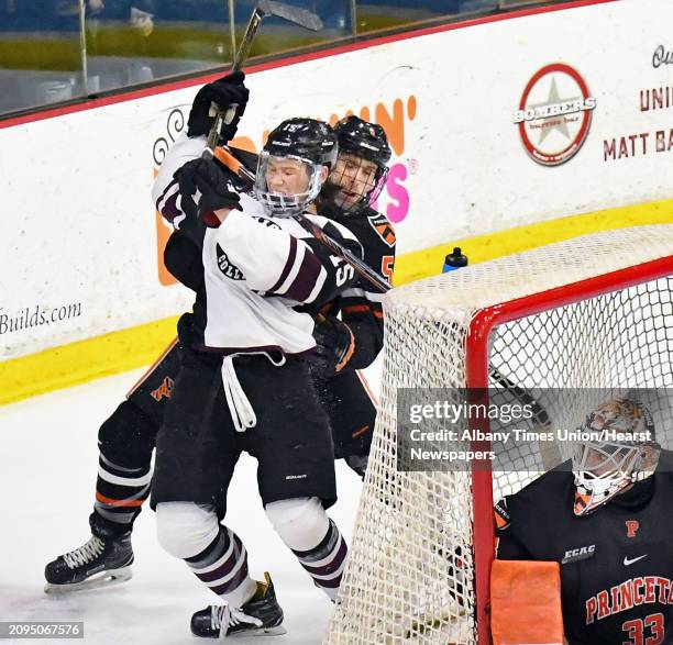 Union's Spencer Foo, left, is fouled by Princeton's Hayden Anderson during game one of their ECAC quarterfinal game at Messa Rink Friday March 10,...