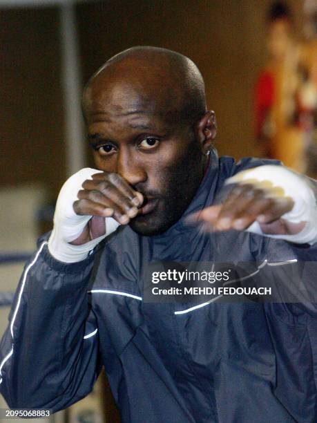 French former light-welterweight WBA world champion Souleymane M'Baye trains 07 November 2007 in Levallois-Perret, outside Paris. M'Baye will meet...