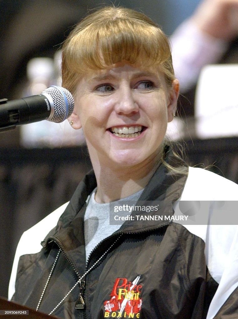 Former US figure skater turned boxer Tonya Harding smiles as she is ...