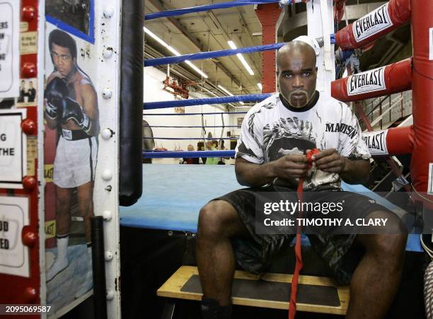 And WBC cruiserweight champion Jean-Marc Mormeck of France prepares to work out for the media at the Church Street Gym in New York 03 January 2006 in...