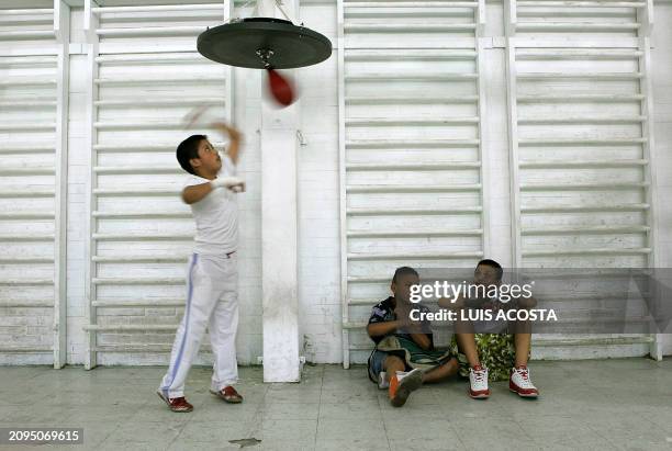 Boys take part in a training session at the Tepito's boxing Club in Mexico City, 2th April, 2007. The Tepito's boxing Club is located in a "rough...