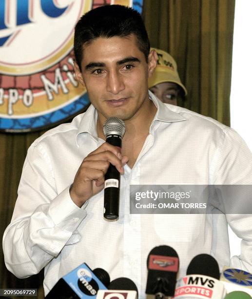 The number one in the feather weight category Erik Morales, from Mexico , speaks 24 September 2002, during a press conference where he anounced the...