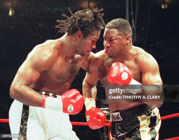 Lennox Lewis from Great Britain squares off against Ray Mercer of the US 10 May at Madison Square Garden in New York. Lewis, who hopes to fight Mike...