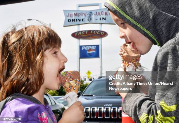 Mikayla Salway left, of Rotterdam and her brother Michael enjoy an end of season ice cream cone as Jumpin' Jacks Drvie-In enters its final weekend...