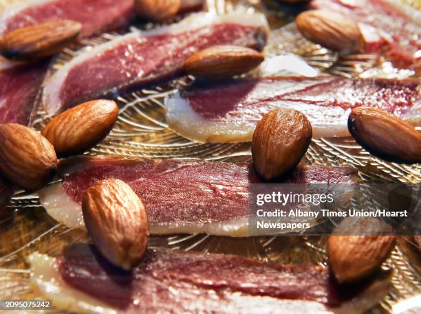 Housemade duck prosciutto with almonds at the Lost & Found restaurant on Broadway Tuesday Dec. 5, 2017 in Albany, NY.