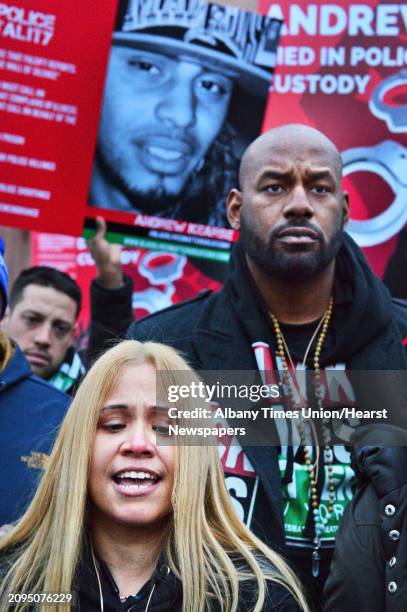 Angelique Negroni-Kearse, left, whose husband died in police custody and Hawk Newsome of Black Lives Matter Greater New York join supporters outside...