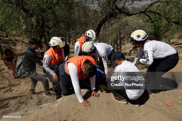 Members of Civil Protection are rescuing a person who suffered a fall while climbing Cerro de la Estrella in the Iztapalapa mayor's office in Mexico...