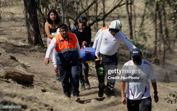 Members of Civil Protection are rescuing a person who suffered a fall while climbing Cerro de la Estrella in the Iztapalapa mayor's office in Mexico...