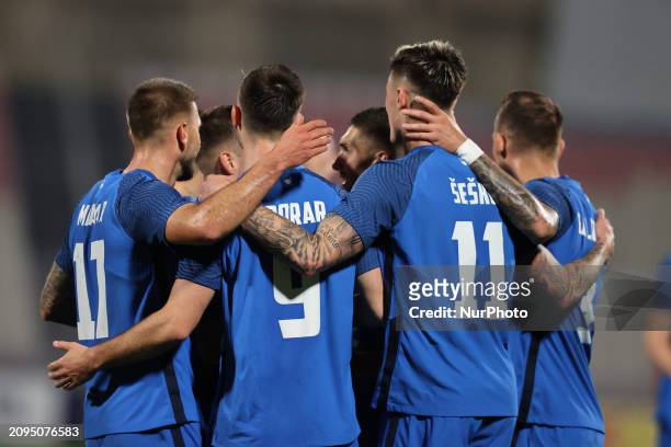 Andraz Sporar, second from the left, of Slovenia is celebrating with his teammates after scoring the first goal, making it 0-1, during the friendly...