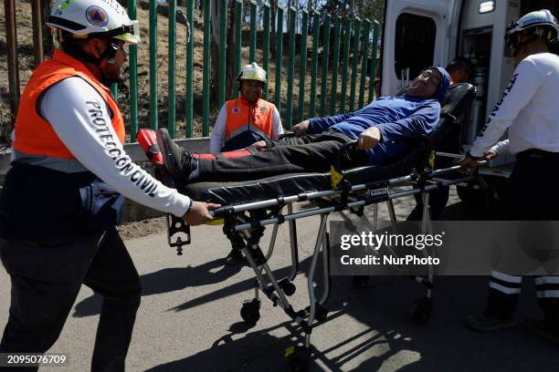 Members of Civil Protection are rescuing a person who suffered a fall while climbing Cerro de la Estrella in the Iztapalapa mayor's office in Mexico...