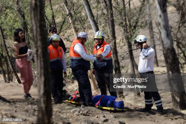 Members of Civil Protection are rescuing a person who suffered a fall while climbing Cerro de la Estrella in the Iztapalapa mayor's office in Mexico...