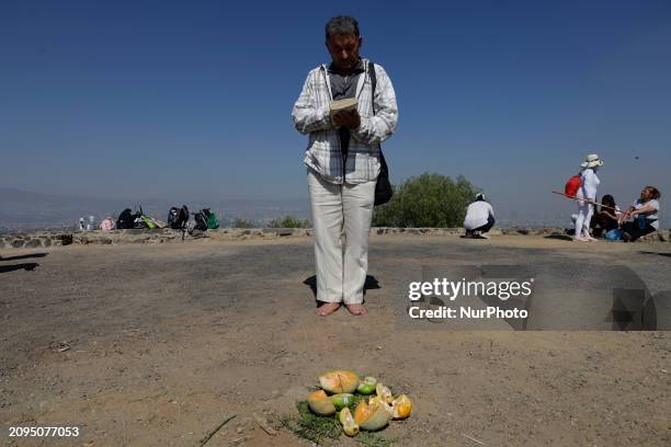 Person is visiting the Cerro de la Estrella archaeological site in Mexico City, where they are performing various rituals to ''charge themselves with...