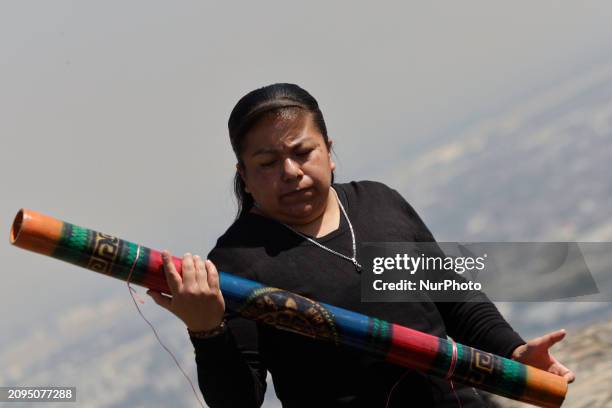 Person is visiting the Cerro de la Estrella archaeological site in Mexico City, where they are performing various rituals to ''charge themselves with...