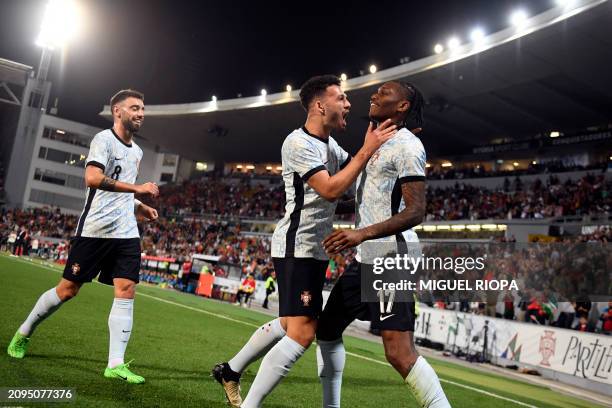 Portugal's forward Rafael Leao celebrates scoring the opening goal during the international friendly football match between Portugal and Sweden at...