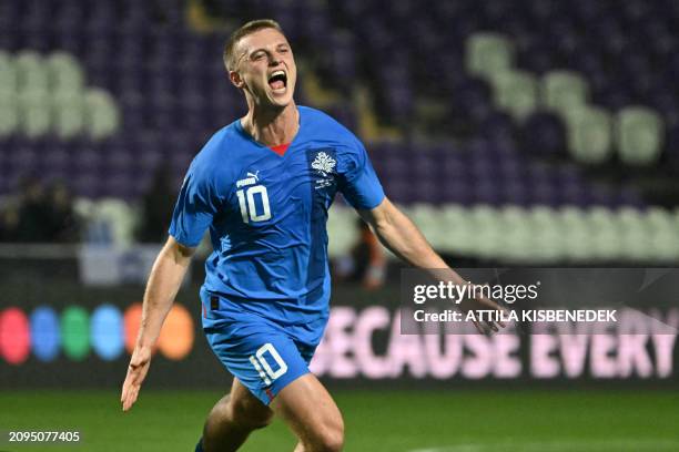 Iceland's forward Albert Gudmundsson celebrates scoring his equalizing 1-1 goal during the UEFA EURO 2024 qualifier play-off semi-final football...