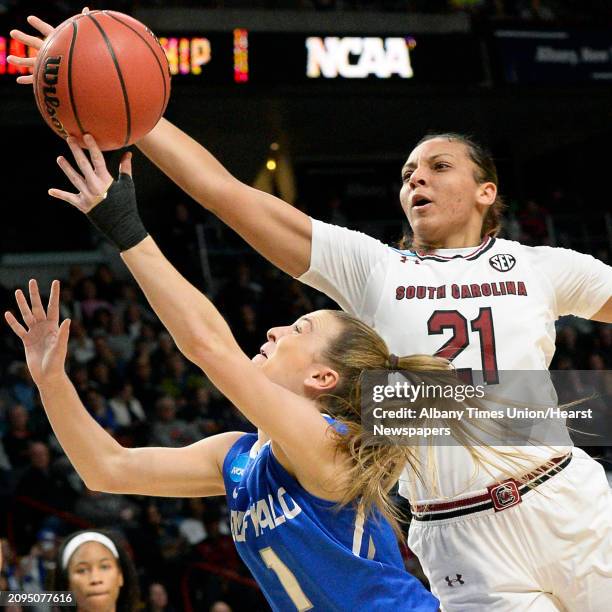 South Carolina's Mikiah Herbert Harrigan, right, and Buffalo's Stephanie Reid battle under the basket during their NCAA Women's Basketball Tournament...