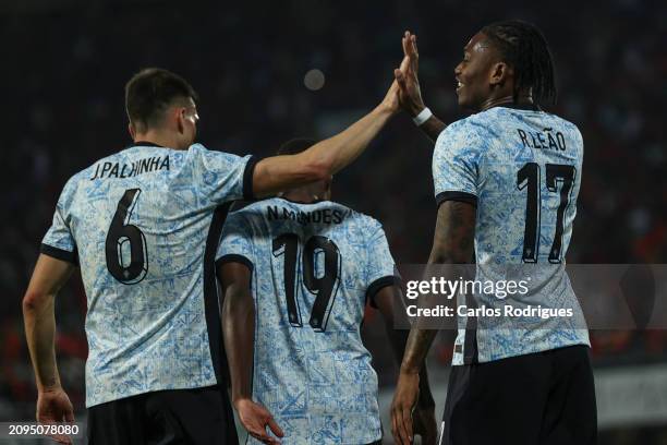 Rafael Leao of Portugal celebrates scoring Portugal first goal with Joao Palhinha of Portugal during the international friendly match between...