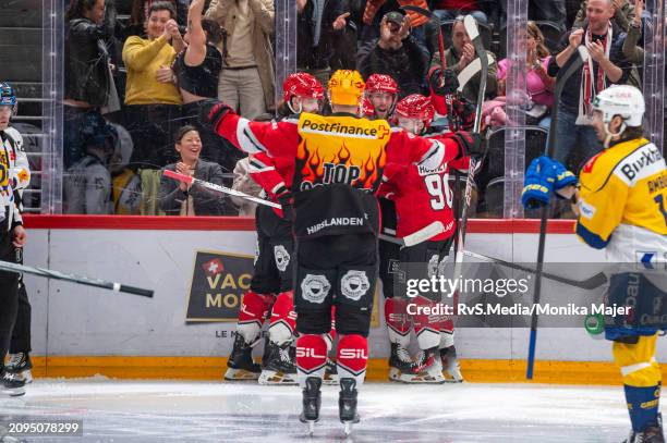 Jiri Sekac of Lausanne HC celebrates his goal with teammates during the Swiss National League Play Offs game between Lausanne HC and HC Davos at...