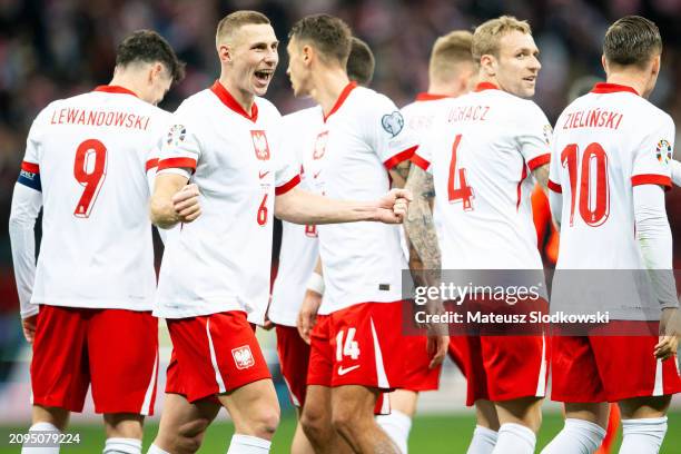Jakub Piotrowski of Poland celebrates after scoring for 3:0 during the UEFA EURO 2024 Play-Offs semifinal match between Poland and Estonia at PGE...