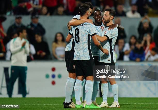 Bruma of Portugal celebrates with teammates after scoring a goal during the International Friendly match between Portugal and Sweden at Estadio D....