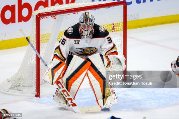 Goaltender John Gibson of the Anaheim Ducks guards the net during third period action against the Winnipeg Jets at Canada Life Centre on March 15,...