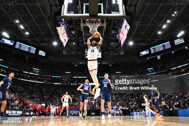 DaRon Holmes II of the Dayton Flyers dunks the ball during the first round of the 2024 NCAA Men's Basketball Tournament held at Delta Center on March...