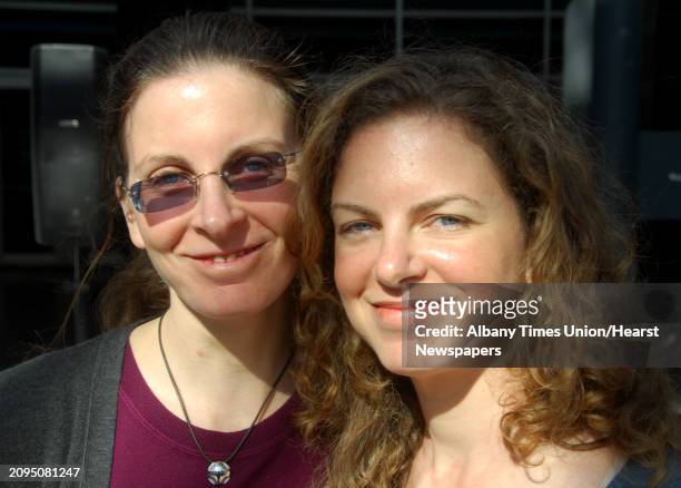 Clare, left, and Sara Bronfman, right, poses for a photo after speaking at a news conference to discuss the schedule of events for the Dalai Lama's...