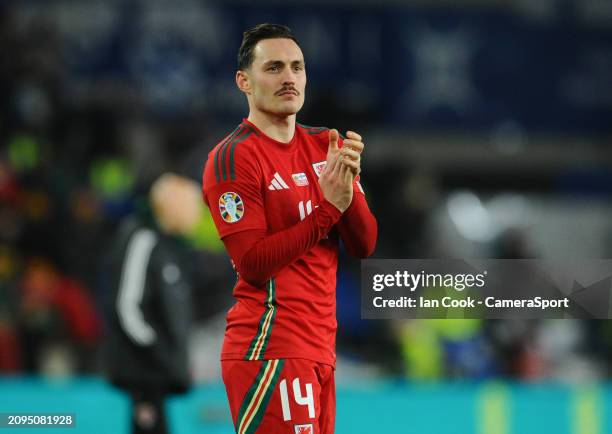 Wales' Connor Roberts applauds the fans at the final whistle during the UEFA European Championship Qualifier Semi-Final match between Wales and...