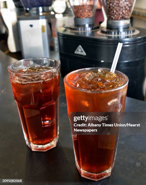 Glasses of iced coffee, left, and cold-brew coffee at Stacks Espresso Thursday Sept. 6, 2018 in Albany, NY.