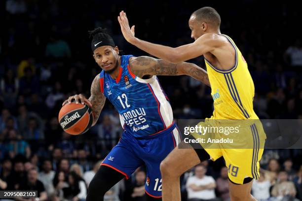 Will Clyburn of Anadolu Efes in action against Louis Olinde of Alba Berlin during the Turkish Airlines EuroLeague week 31 basketball match between...